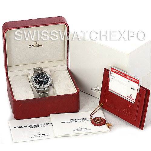 The image shows an Omega Seamaster 2598.80.00 Men
s Stainless Steel Blue Dial 2598.80.00 Men
s Stainless Steel Blue Dial watch in its box along with warranty cards and a service booklet.