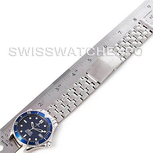 This image shows the Omega Seamaster 2531.80.00 Men
s Stainless Steel Blue Dial 2531.80.00 Men
s Stainless Steel Blue Dial watch laid flat with a metal bracelet and ruler measuring its length from a top-down angle.