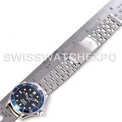 The Omega Seamaster 2531.80.00 Men
s Stainless Steel Blue Dial 2531.80.00 Men
s Stainless Steel Blue Dial watch is shown from a top-down angle, displaying the face, bezel, and metal bracelet next to a ruler for scale.