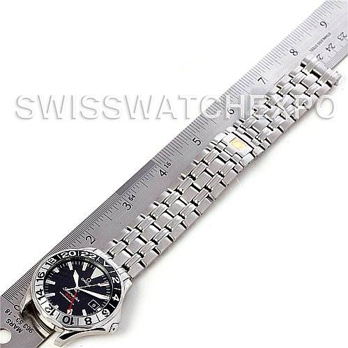 The Omega Seamaster 2534.50.00 Men
s Stainless Steel Black Dial 2534.50.00 Men
s Stainless Steel Black Dial watch is shown from an overhead angle, displaying the watch head, bracelet, and a ruler for scale.