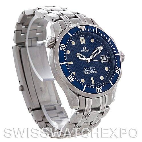 The image shows an Omega Seamaster 2223.80.00 Men's Stainless Steel Blue Dial 2223.80.00 Men's Stainless Steel Blue Dial watch from a slightly angled side view, highlighting the blue dial, bezel, and silver bracelet.