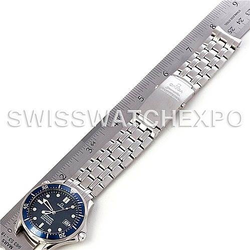 The image shows an Omega Seamaster 2531.80.00 Men
s Stainless Steel Blue Dial 2531.80.00 Men
s Stainless Steel Blue Dial watch laid flat with its bracelet extended next to a ruler for size reference.