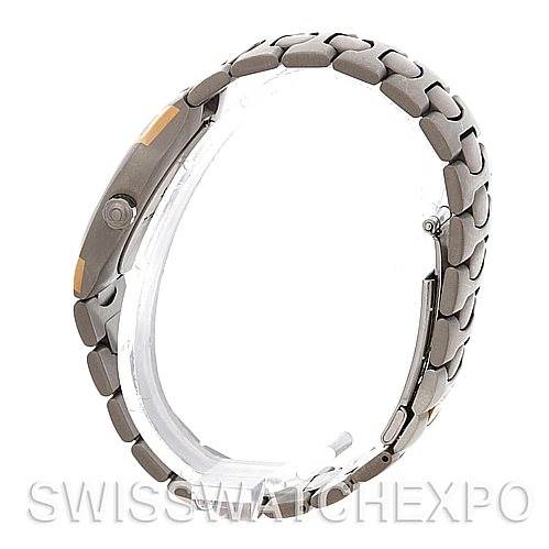 The image displays a side view of the Omega Seamaster 2510.40 Men's Titanium Champagne Dial 2510.40 Men's Titanium Champagne Dial watch, highlighting its metal bracelet and clasp.