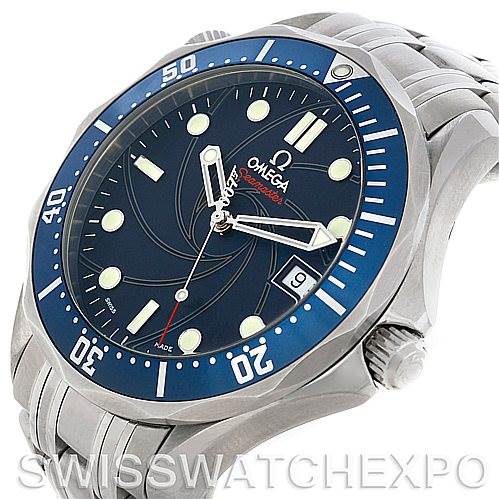 The image shows a side angle of the Omega Seamaster 2226.80 Men's Stainless Steel Blue Dial 2226.80 Men's Stainless Steel Blue Dial watch highlighting its blue bezel, dial, and stainless steel bracelet.