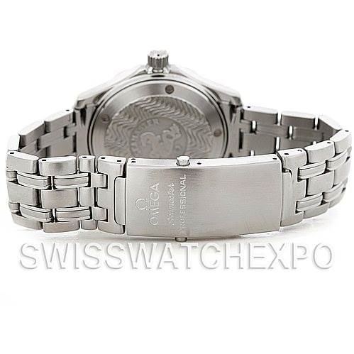 The image shows the back and clasp of an Omega Seamaster 2562.80.00 Men's Stainless Steel Blue Dial 2562.80.00 Men's Stainless Steel Blue Dial watch with a detailed engraving on the case back.