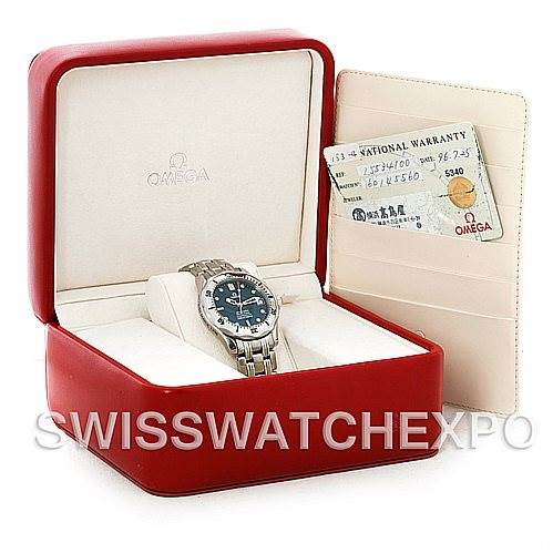 The Omega Seamaster 2553.41.00 Men's Stainless Steel Green Dial 2553.41.00 Men's Stainless Steel Green Dial watch is shown from an angled top view, inside its red box with an open warranty card holder beside it.