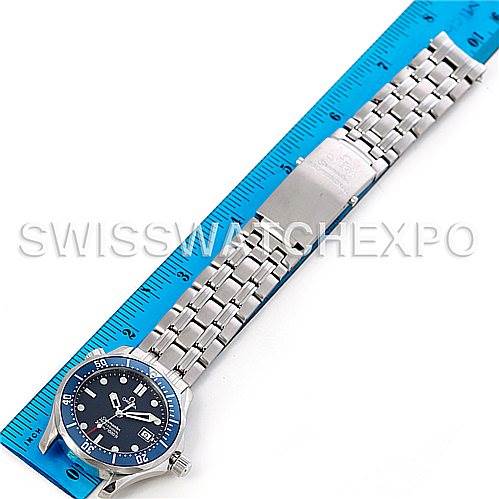 The image shows the Omega Seamaster 2223.80.00 Men's Stainless Steel Blue Dial 2223.80.00 Men's Stainless Steel Blue Dial watch, fully extended, placed next to a blue ruler for measurement.