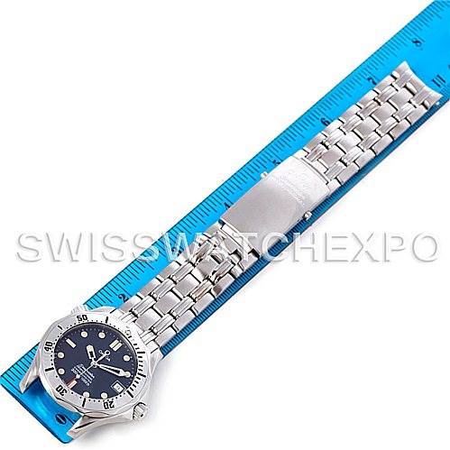 The image shows the Omega Seamaster 2562.80.00 Men
s Stainless Steel Blue Dial 2562.80.00 Men
s Stainless Steel Blue Dial watch laid flat with its bracelet extended next to a ruler, showcasing the full length of the watch and band.