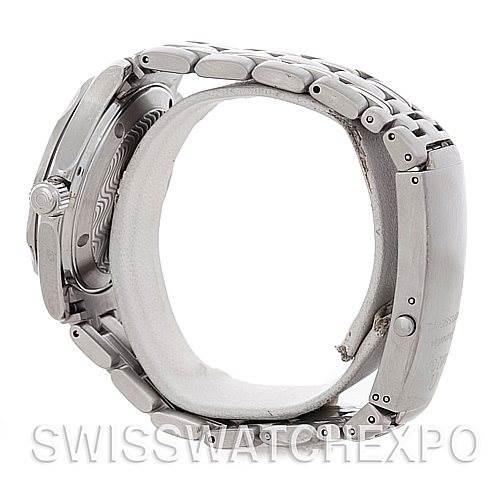 This side view shows the Omega Seamaster 2223.80.00 Men
s Stainless Steel Blue Dial 2223.80.00 Men
s Stainless Steel Blue Dial watch
s crown, case profile, and bracelet clasp.