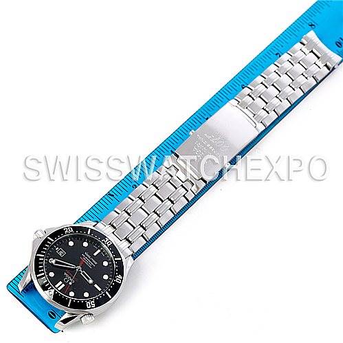 The image shows an Omega Seamaster 212.30.41.20.01.001 Men's Stainless Steel Black Dial 212.30.41.20.01.001 Men's Stainless Steel Black Dial watch laid flat against a blue ruler, displaying the face, bezel, case, and metal bracelet.