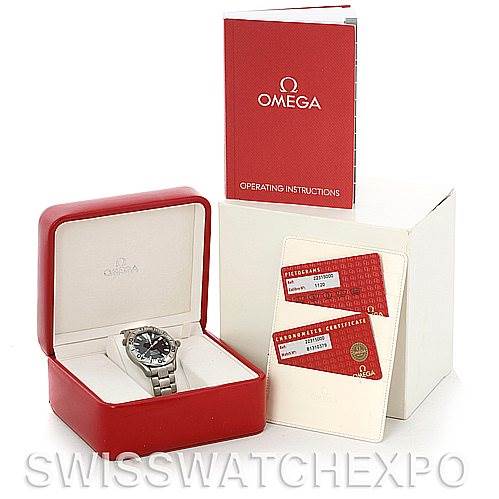 The image shows the Omega Seamaster 2231.50.00 Titanium Black Dial 2231.50.00 Titanium Black Dial watch in its open box, along with the operating instructions and two certification cards.