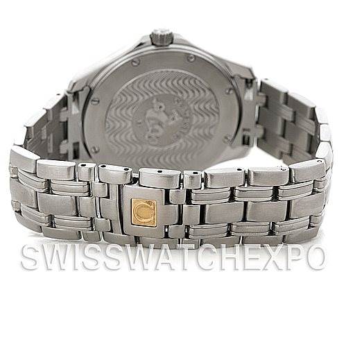 The image shows the back of the Omega Seamaster 2521.81.00 Men's Stainless Steel Blue Dial 2521.81.00 Men's Stainless Steel Blue Dial watch, highlighting its clasp, bracelet, and case back with intricate engraving.