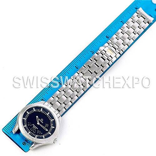 The image shows an Omega Seamaster 2521.81.00 Men's Stainless Steel Blue Dial 2521.81.00 Men's Stainless Steel Blue Dial watch laid flat against a blue ruler, displaying the entire face and stainless steel bracelet.