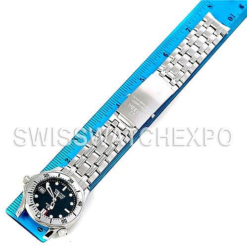 The image shows an Omega Seamaster 2562.80.00 Men's Stainless Steel Blue Dial 2562.80.00 Men's Stainless Steel Blue Dial watch laid flat with a blue ruler, displaying the face, bezel, and stainless steel bracelet.