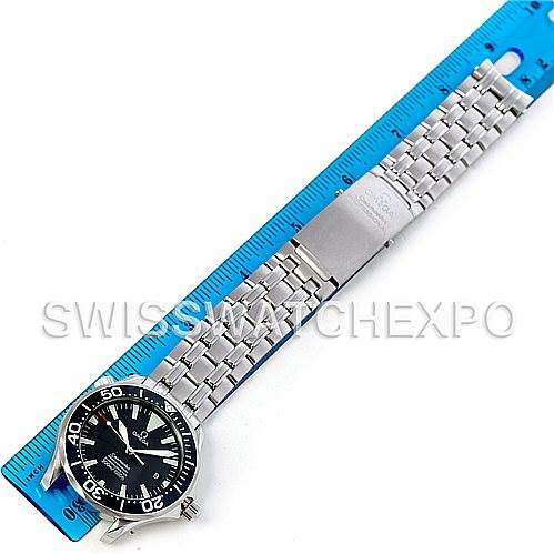 The image shows an Omega Seamaster 2254.50.00 Men's Stainless Steel Black Dial 2254.50.00 Men's Stainless Steel Black Dial watch laid flat with its stainless steel strap extended next to a blue ruler.