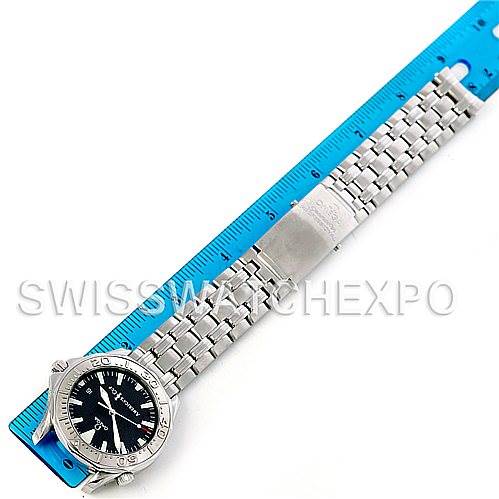 The image shows an Omega Seamaster 2533.50.00 Men's Stainless Steel Black Dial 2533.50.00 Men's Stainless Steel Black Dial watch laid out flat beside a ruler, displaying its face and full metal bracelet.