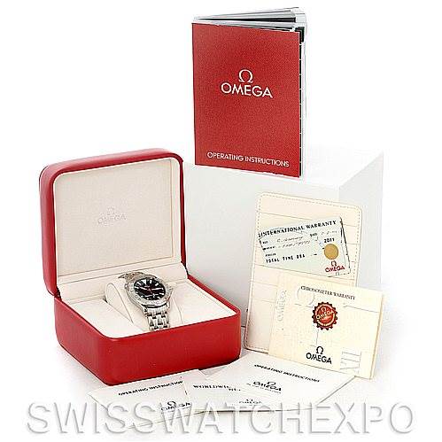 The image shows an Omega Seamaster 2533.50.00 Men's Stainless Steel Black Dial 2533.50.00 Men's Stainless Steel Black Dial watch at a front angle, along with its red case, operating instructions, and warranty cards.