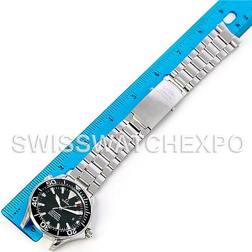 The image shows an Omega Seamaster 2254.50.00 Men's Stainless Steel Black Dial 2254.50.00 Men's Stainless Steel Black Dial watch laid flat next to a blue ruler, displaying its face and metal bracelet.