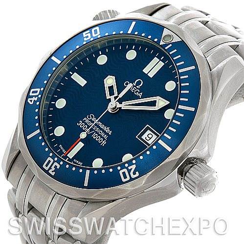 The image shows a close-up of the Omega Seamaster 2223.80.00 Men's Stainless Steel Blue Dial 2223.80.00 Men's Stainless Steel Blue Dial's face, bezel, crown, and part of the bracelet from an angled perspective.