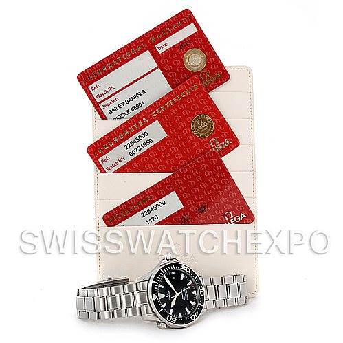 This image shows an Omega Seamaster 2254.50.00 Men
s Stainless Steel Black Dial 2254.50.00 Men
s Stainless Steel Black Dial watch with its metallic strap, alongside three red warranty cards.