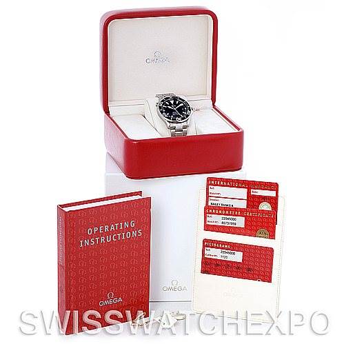 The image shows an Omega Seamaster 2254.50.00 Men
s Stainless Steel Black Dial 2254.50.00 Men
s Stainless Steel Black Dial watch in its box accompanied by operating instructions and warranty cards.