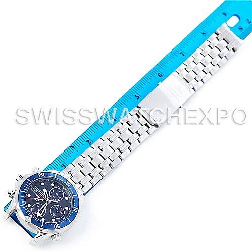 The image shows an Omega Seamaster 2225.80.00 Men's Stainless Steel Blue Dial 2225.80.00 Men's Stainless Steel Blue Dial watch laid flat with a ruler beside it, displaying the face, bezel, and bracelet.