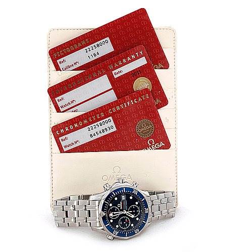 The image displays an Omega Seamaster 2225.80.00 Men's Stainless Steel Blue Dial 2225.80.00 Men's Stainless Steel Blue Dial watch laid on a pouch along with warranty and certification cards.