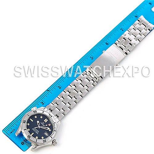 The image shows an Omega Seamaster 2562.80.00 Men's Stainless Steel Blue Dial 2562.80.00 Men's Stainless Steel Blue Dial watch laid flat next to a blue ruler, displaying the full bracelet and face.