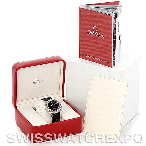 This image shows an Omega Seamaster Men's Stainless Steel Black Dial Men's Stainless Steel Black Dial watch at an angle, along with its box, operating instructions, and warranty cards.