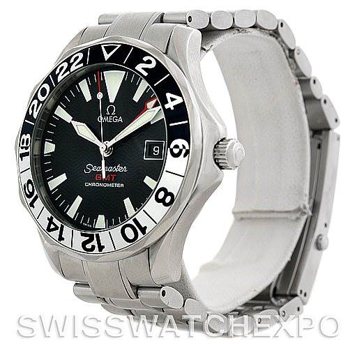The image shows a side angle of the Omega Seamaster 2234.50.00 Men
s Stainless Steel Black Dial 2234.50.00 Men
s Stainless Steel Black Dial watch, displaying its round face, bezel, and metal bracelet.