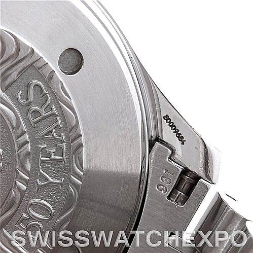 The image shows a close-up of the back case and bracelet attachment of an Omega Seamaster 2234.50.00 Men
s Stainless Steel Black Dial 2234.50.00 Men
s Stainless Steel Black Dial watch, highlighting an engraved "50 YEARS".