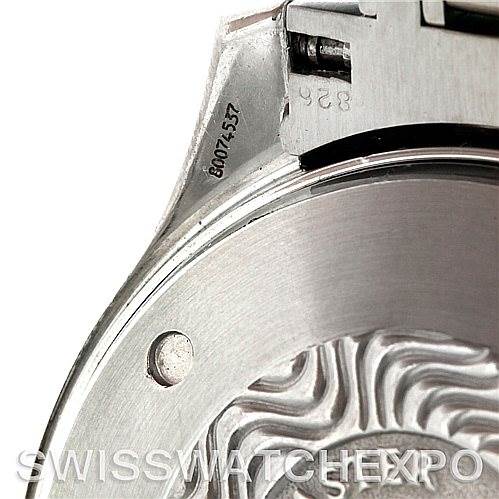 This image shows a close-up of the case back and part of the strap or clasp of an Omega Seamaster 2598.80.00 Men
s Stainless Steel Blue Dial 2598.80.00 Men
s Stainless Steel Blue Dial watch.