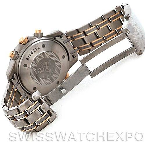 The image shows the back case and bracelet of an Omega Seamaster 2296.80.00 Men
s Titanium Blue Dial 2296.80.00 Men
s Titanium Blue Dial watch, highlighting the titanium material and clasp mechanism.