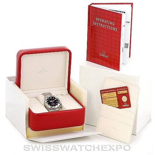 The image shows an Omega Seamaster 2595.50.00 Men
s Stainless Steel Black Dial 2595.50.00 Men
s Stainless Steel Black Dial watch in its box with accompanying operating instructions, an international warranty card, and additional packaging.