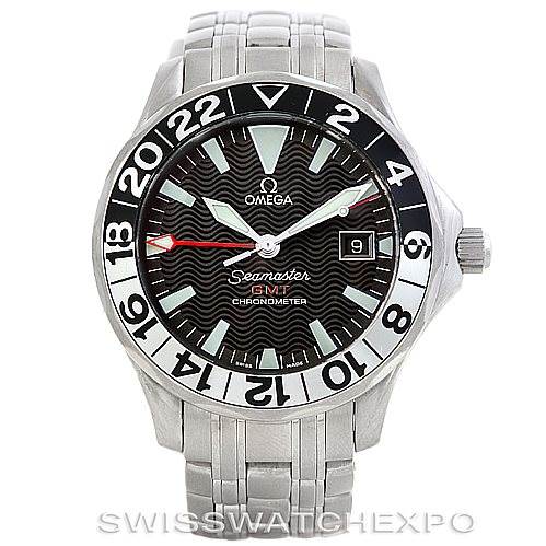 The image shows a front view of an Omega Seamaster 2234.50.00 Men
s Stainless Steel Black Dial 2234.50.00 Men
s Stainless Steel Black Dial GMT watch, highlighting the bezel, dial, hands, bracelet, and date window.