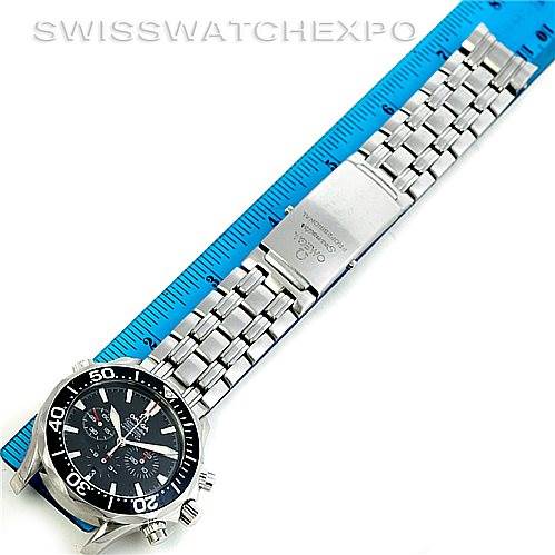 The image shows an Omega Seamaster 2594.52.00 Men
s Stainless Steel Black Dial 2594.52.00 Men
s Stainless Steel Black Dial watch fully extended, featuring the watch face, bezel, and metal bracelet with a clasp against a ruler.