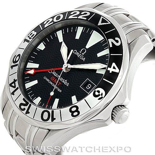 This image shows an Omega Seamaster 2234.50.00 Men
s Stainless Steel Black Dial 2234.50.00 Men
s Stainless Steel Black Dial GMT watch at a three-quarter angle highlighting the watch face, bezel, and part of the bracelet.
