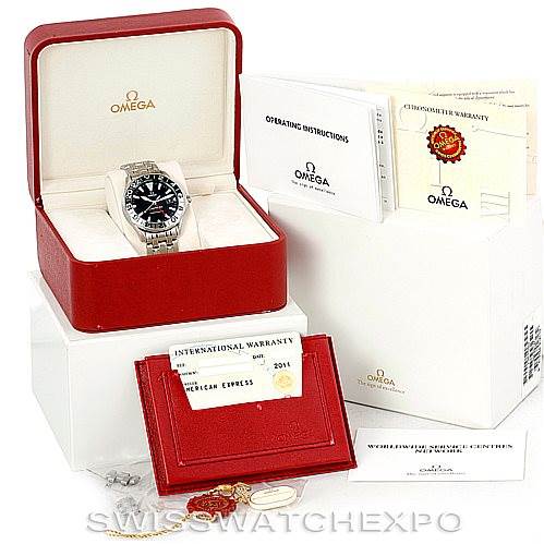 This image shows an Omega Seamaster 2234.50.00 Men
s Stainless Steel Black Dial 2234.50.00 Men
s Stainless Steel Black Dial watch along with its red case, warranty card, operating instructions, and certificates.