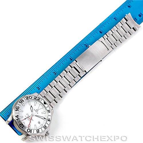 The image shows an Omega Seamaster 2538.20.00 Men
s Stainless Steel White Dial 2538.20.00 Men
s Stainless Steel White Dial watch laid flat with a metal bracelet, positioned alongside a blue ruler.