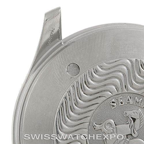 This image shows the back case cover of an Omega Seamaster 2538.20.00 Men
s Stainless Steel White Dial 2538.20.00 Men
s Stainless Steel White Dial watch, focusing on the embossed design and part of the edge.