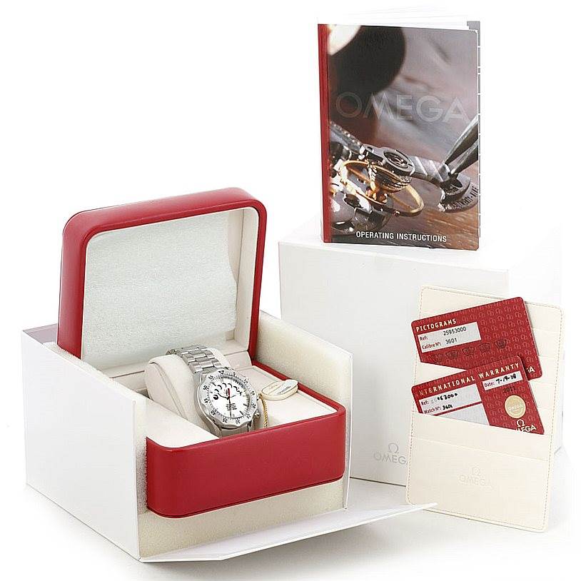 The Omega Seamaster 2595.30.00 Men
s Stainless Steel Silver Dial 2595.30.00 Men
s Stainless Steel Silver Dial watch is shown in its open box with a booklet and warranty cards beside it.