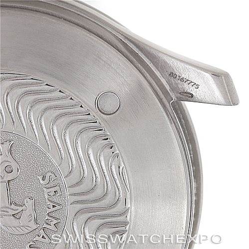 The image shows part of the case back with the embossed logo and serial number of an Omega Seamaster 2538.20.00 Men
s Stainless Steel White Dial 2538.20.00 Men
s Stainless Steel White Dial watch.