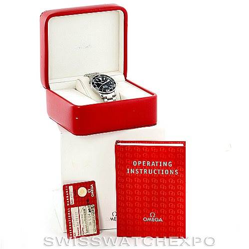 The image shows the Omega Seamaster 2254.50.00 Men
s Stainless Steel Black Dial 2254.50.00 Men
s Stainless Steel Black Dial watch at an angle in its open box, alongside the operating instructions and warranty card.