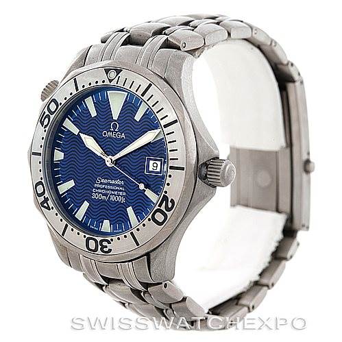 The Omega Seamaster 2231.80.00 Men
s Titanium Blue Dial 2231.80.00 Men
s Titanium Blue Dial watch is shown from an angled side view, displaying the face, bezel, crown, and metal bracelet.