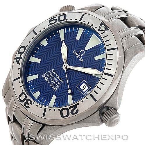 This image shows a close-up angle of the Omega Seamaster 2231.80.00 Men
s Titanium Blue Dial 2231.80.00 Men
s Titanium Blue Dial watch featuring its blue dial, bezel, and part of the metal bracelet.