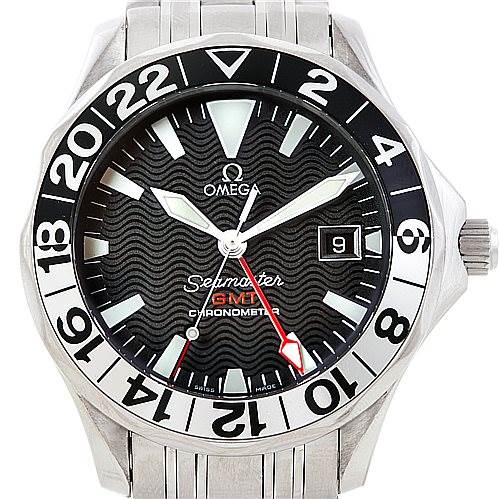 The image shows a frontal view of an Omega Seamaster 2234.50.00 Men
s Stainless Steel Black Dial 2234.50.00 Men
s Stainless Steel Black Dial GMT Chronometer watch, highlighting its dial, hands, and date display.