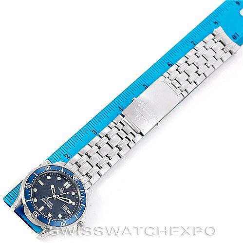 This image shows an Omega Seamaster 2541.80.00 Men
s Stainless Steel Blue Dial 2541.80.00 Men
s Stainless Steel Blue Dial watch laid flat with the face and bracelet fully visible, alongside a blue ruler.