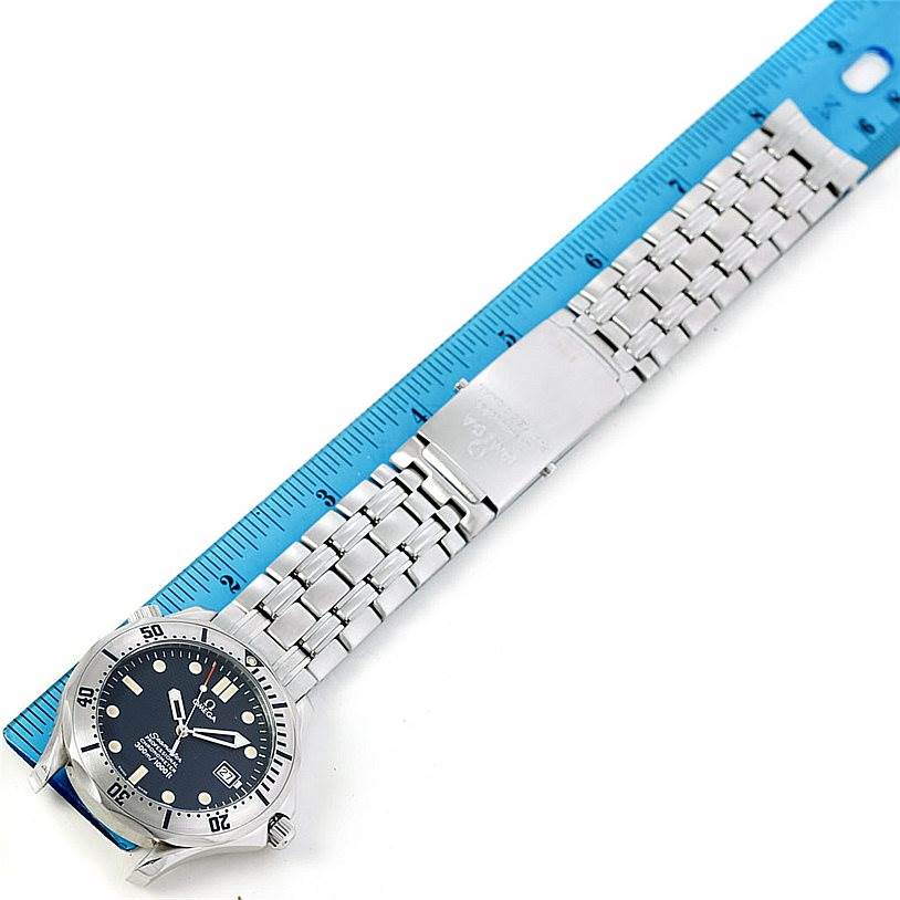 The image shows an Omega Seamaster 2532.80.00 Men's Stainless Steel Grey Dial 2532.80.00 Men's Stainless Steel Grey Dial watch laid flat with the dial and entire metal bracelet visible alongside a ruler.