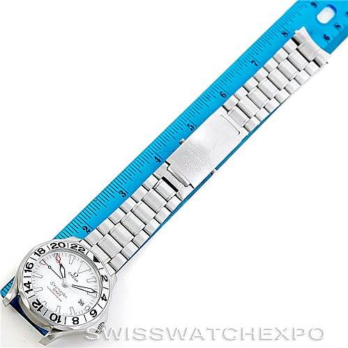 The image shows an Omega Seamaster 2538.20.00 Men
s Stainless Steel White Dial 2538.20.00 Men
s Stainless Steel White Dial watch laid flat next to a ruler, displaying the dial and metal bracelet from a top-down angle.