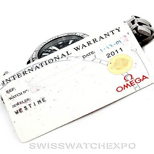 The image shows a partial view of an Omega Seamaster 2031.50.00 Men
s Titanium Black Dial 2031.50.00 Men
s Titanium Black Dial watch and its International Warranty card.